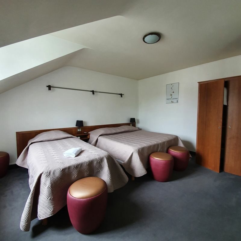 Chambre triple - lit