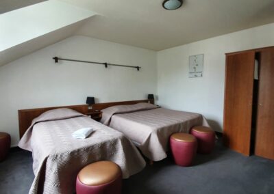 Chambre triple - lit